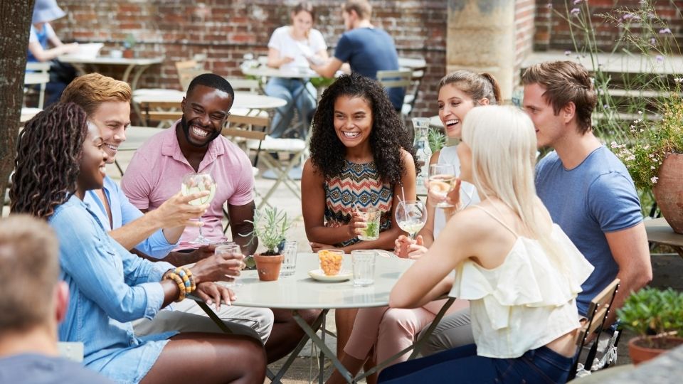 Group of Millennial Friends Drinking Wine