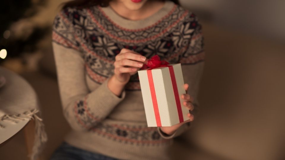 Woman Holding a Gift