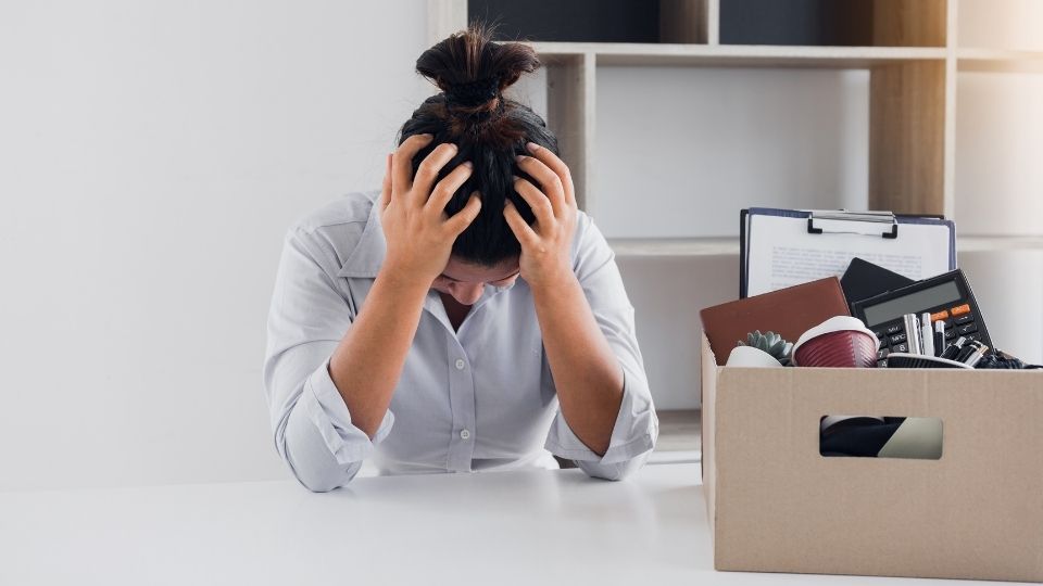 Woman Stressed from Losing Job